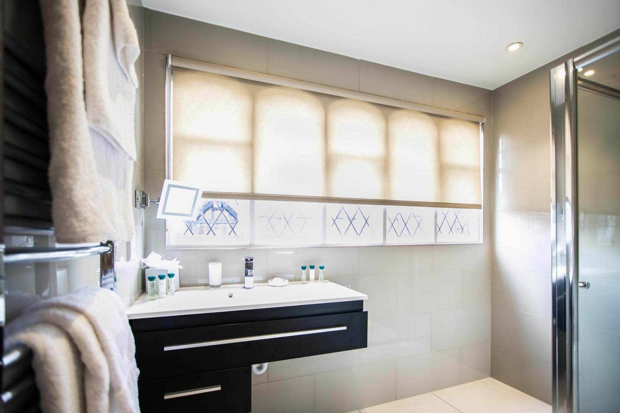Suite met 1 Tweepersoonsbed of 2 Aparte Bedden
